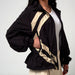 Regenjacke «Elizeh» in deep black/brown rice von Gofranck