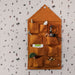 House Wall Storage in mustard von Ferm Living