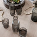 «Ripple» Small Carafe Set in smoked grey von Ferm Living